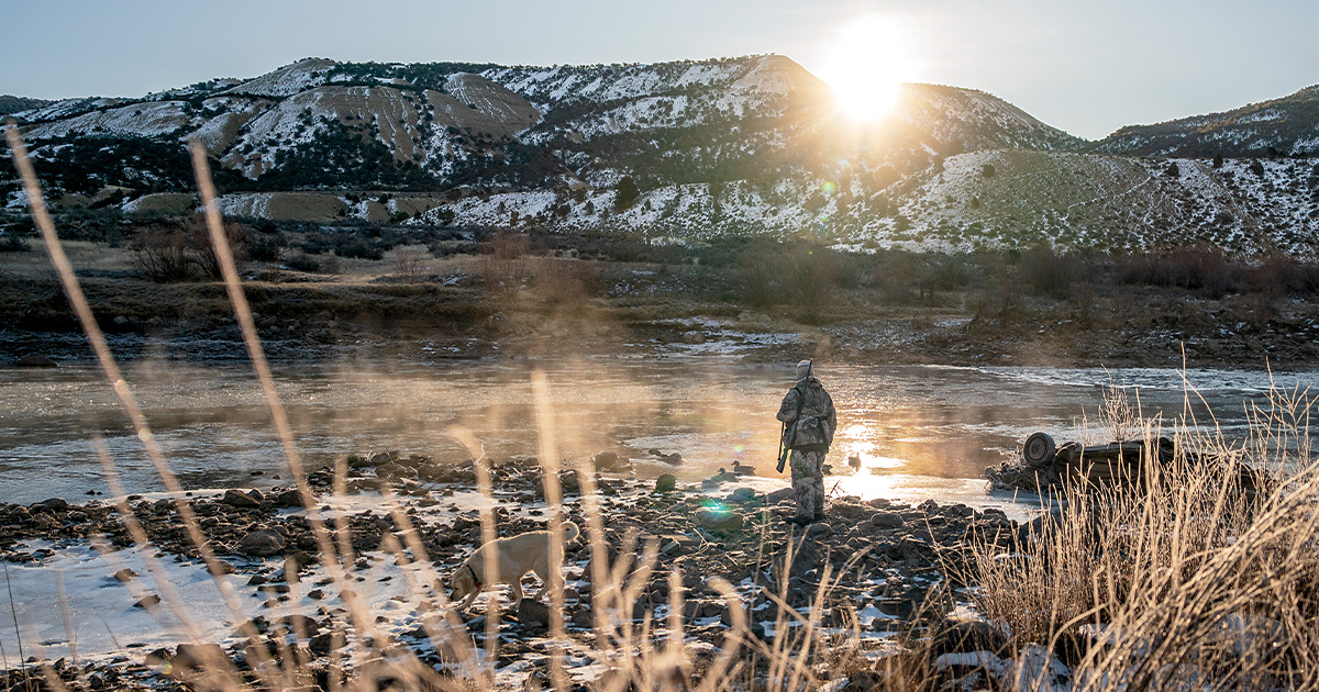 Hunter and scenic view. Photo by Greg Sweeney
