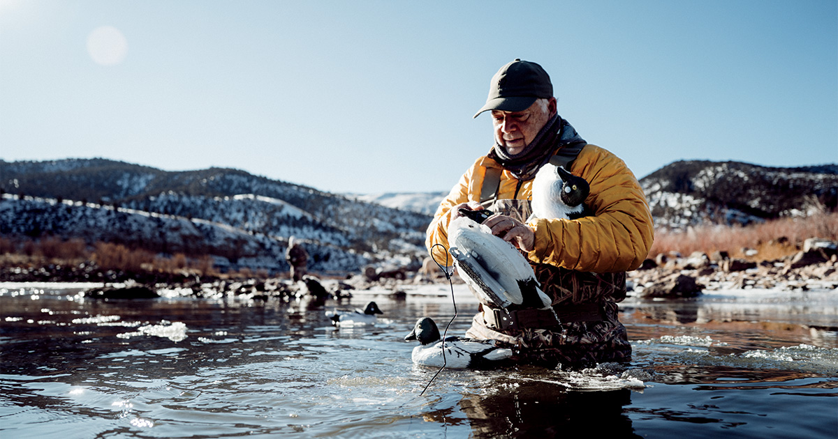Hunter with decoys. Photo by Greg Sweeney