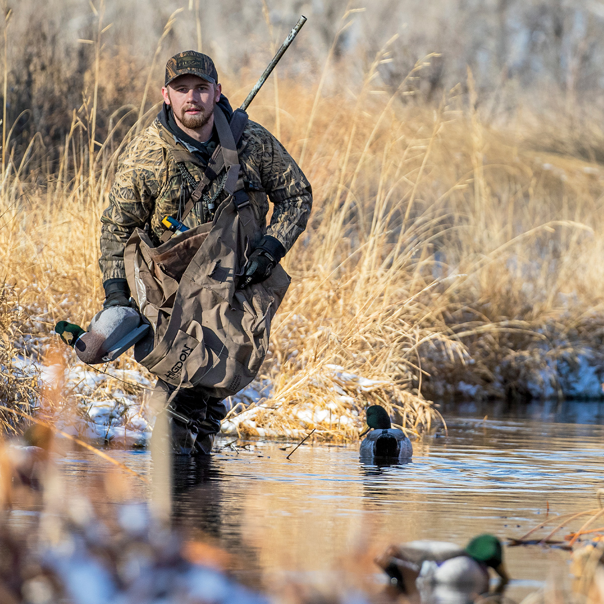 Hunter placing decoys. Photo by DougSteinePhotos.com
