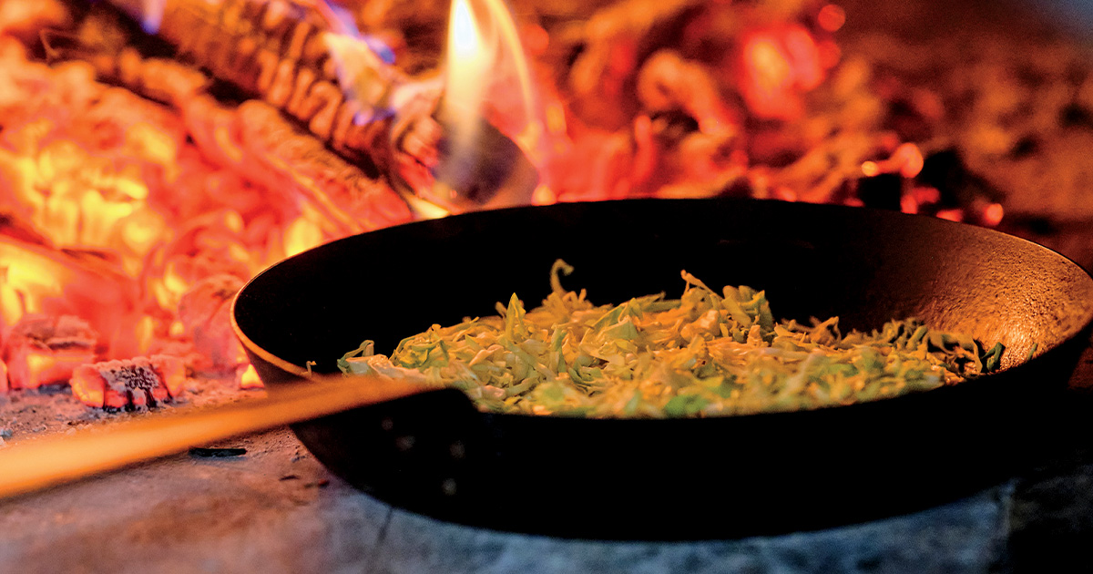 Preparing skillet-roasted cabbage. Photo by Brandon Amato